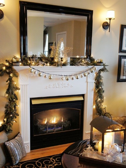 elegant gold lit decorated fireplace