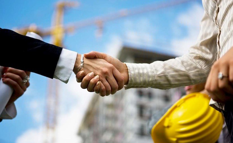 hand shake with construction worker